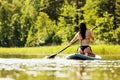 Stand up paddle board woman paddleboarding on SUP Royalty Free Stock Photo