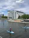 Standup Paddleboarding on the river Thames in London England Royalty Free Stock Photo