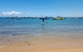 Stand up paddle boarding in a bay in Bahia, Brazil