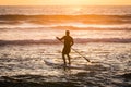 Stand up paddler silhouette at sunset Royalty Free Stock Photo