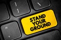 Stand Your Ground text button on keyboard, concept background