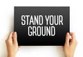 Stand Your Ground text on card, concept background