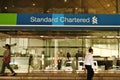 Standard chartered among citizens passing activity Royalty Free Stock Photo