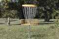 Standard Disc Golf basket or target. Disc Golf is played over 9 or 18 holes and shares many rules with traditional golf Royalty Free Stock Photo