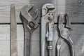 A plumbing set consisting of wrenches, pliers and a file Royalty Free Stock Photo