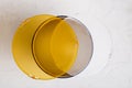 Standard reflector with matt white and yellow diffuser on a white background. Different diffusers for light temperatures. Royalty Free Stock Photo