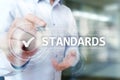 Standards, Quality Control, Assurance, ISO, Checkbox on virtual screen. Royalty Free Stock Photo