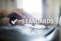 Standards, Quality Control, Assurance, ISO, Checkbox on virtual screen. Royalty Free Stock Photo