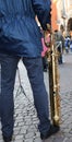 Standing band player and sax
