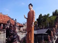 Standing Blessing Buddha Statue At The Front Of Buddhist Temple