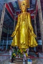 Standing Buddha in Pyi Lone Chamtha pagoda on Mandalay hill, Myanm