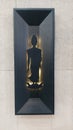 Standing Buddha siluet black with beautiful back light at monestary