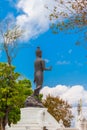 Standing Buddha statue on Doi Pukha above Golden Triangle Royalty Free Stock Photo