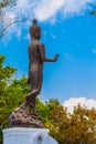 Standing Buddha statue on Doi Pukha above Golden Triangle Royalty Free Stock Photo