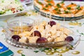 Standing buffet cheese plate with grapes