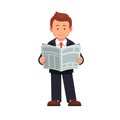 Standing business man reading news paper