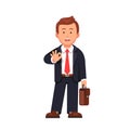 Standing business man showing OK gesture Royalty Free Stock Photo