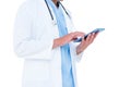 Standing doctor using his tablet Royalty Free Stock Photo