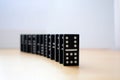 Standing dominoes, domino effect. the domino game. Royalty Free Stock Photo