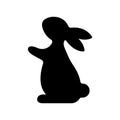 easter bunny black silhouette, rabbit side view, stencil for festive decorations, decorative arts, simple vector design Royalty Free Stock Photo