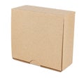 Standing flat square brown cardboard box with closed lid isolated on white background