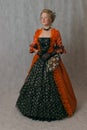 Standing girl in baroque dress Royalty Free Stock Photo