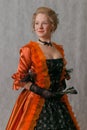 Standing girl in baroque dress Royalty Free Stock Photo