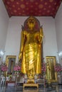 Standing Gold Buddha Statue Wat Phra Chetuphon, Bangkok, Thailand Royalty Free Stock Photo
