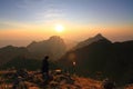 Standing on High mountain in sunset time Royalty Free Stock Photo
