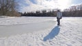 Standing in the ice-skating rink in the frozen lake