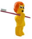 Standing lion and toothbrush in concept dentist