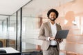 Confident African-American businessman in suit