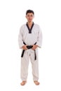 Standing profile of male black belt fighter, full length Royalty Free Stock Photo