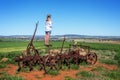 Farmlands views for miles from rusting farm tiller