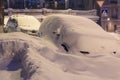 Standing snow-covered cars, heavy snowfall brought drifts frosty Royalty Free Stock Photo