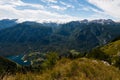 Standing on top of the mountain Planina Blato in the Triglav National Park in Slovenia looking down on Lake Bohinj and the village