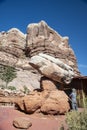 Standing under a falling rock in Arches National Park. Royalty Free Stock Photo