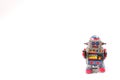 standing vintage tin robot, straight face on white background to insert text / word Royalty Free Stock Photo