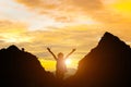 Standing woman holding hand evening sun and mountain silhouette girl stand Royalty Free Stock Photo