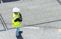 Standing worker on road works Royalty Free Stock Photo