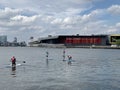 Standup Paddleboarding on the river Thames in London England Royalty Free Stock Photo