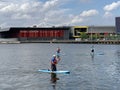 Standup Paddleboarding on the river Thames in London England Royalty Free Stock Photo