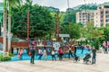 Stanley Plaza on Hong Kong Island in Hong Kong city at daytime. Children playground view with kids playing outdoors. Urban life in