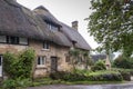 Thatched cottage in the village of Stanton, Cotswolds district of Gloucestershire. It`s built almost completely of Cotswold stone