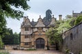 Gatehouse of the Stanway Manor House built in Jacobean period in guiting yellow stone, in the Cotswold village of Stanway Royalty Free Stock Photo