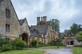 Manor House built in Jacobean period architecture 1630 in guiting yellow stone, in the Cotswold village of Stanway Gloucestershire