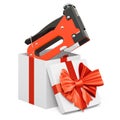 Staple gun inside gift box, present concept. 3D rendering