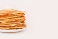 Staple of yeast fluffy pancakes with butter. Spring holiday Traditional Russian Shrovetide Maslenitsa week or pancake