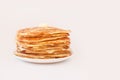 Staple of yeast fluffy pancakes with butter. Spring holiday Traditional Russian Shrovetide Maslenitsa week or pancake