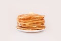 Staple of yeast fluffy pancakes with butter. Spring holiday Traditional Russian Shrovetide Maslenitsa week or pancake